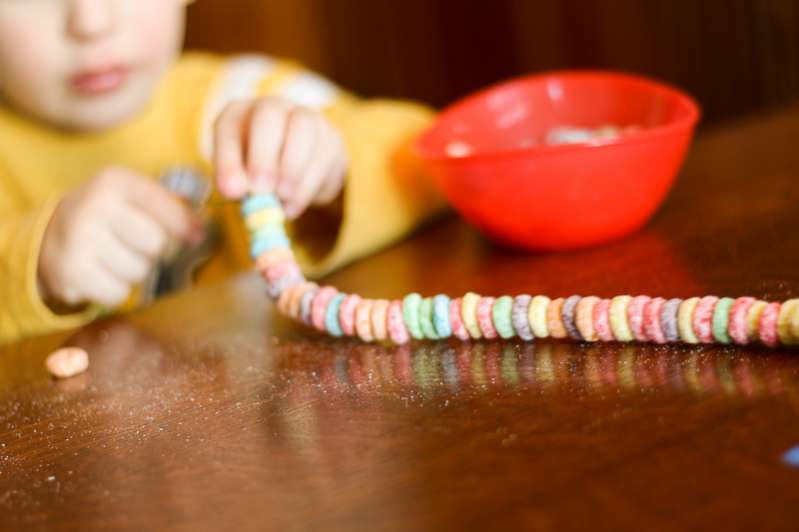 a necklace made of fruit loops cereal