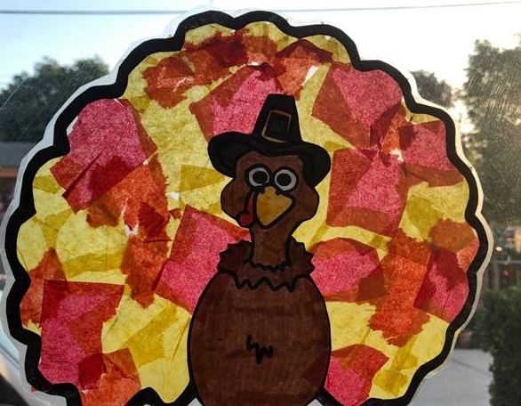turkey suncatcher craft made with markers and tissue paper