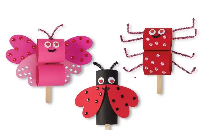 valentine's day themed bugs made from colorful construction paper and tubes