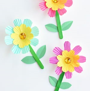flower craft made with cupcake liners and craft sticks
