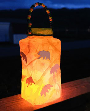 lantern craft made from a milk jug covered with paper decorations