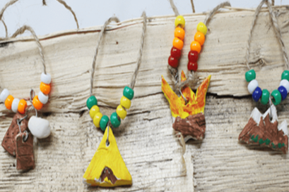 necklaces made with beads and camping decorations