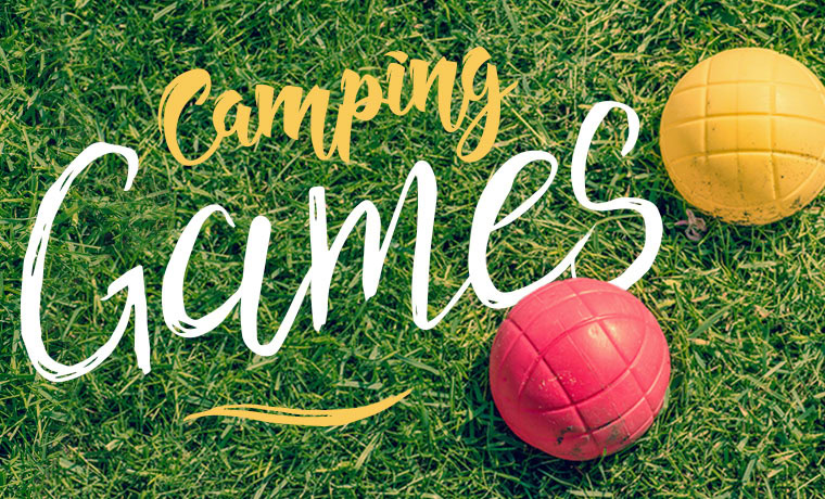 2 volleyballs by the words camping games