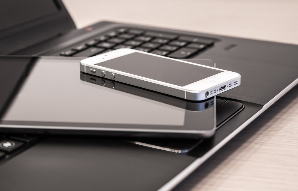 Photo showing laptop, tablet and phone