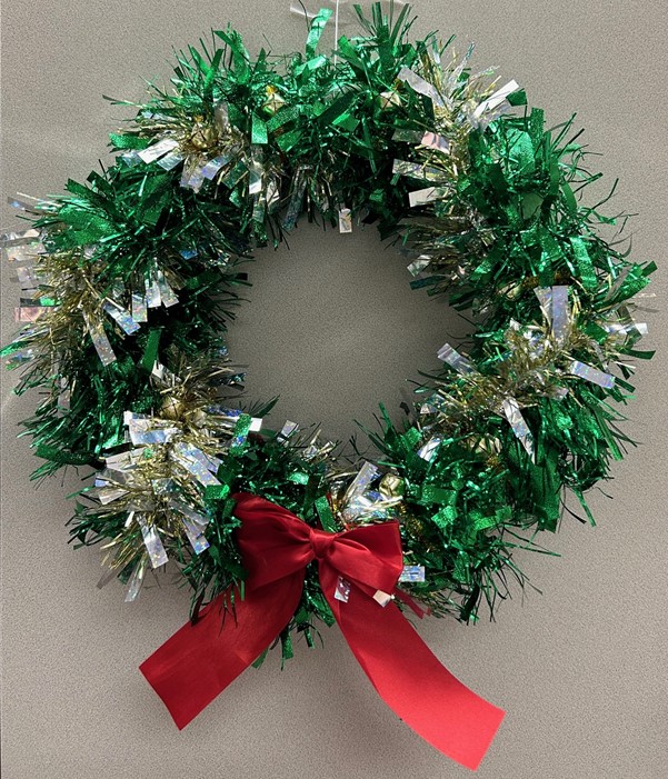 wreath made with garland and a bow