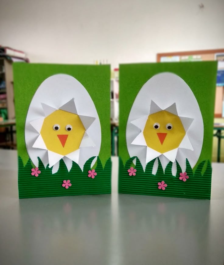 paper craft eggs poking out of paper egg