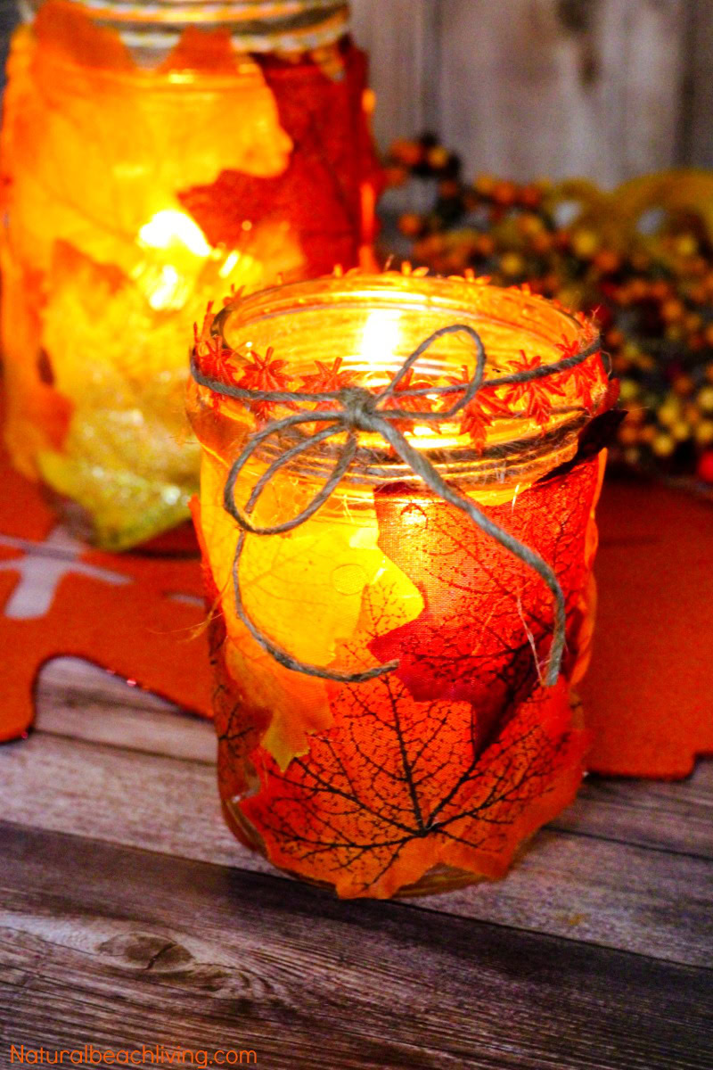mason jar with leaves glued on and tea light inside