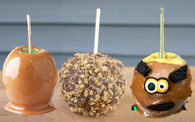 Three caramel apples on the sticks. Plain caramel on the left, heath bits on the middle, and a monster face on the right.