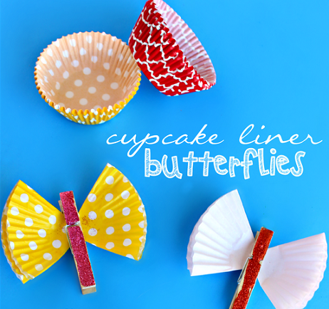 butterfly made with clothespin for the body and folded muffin liner for wings