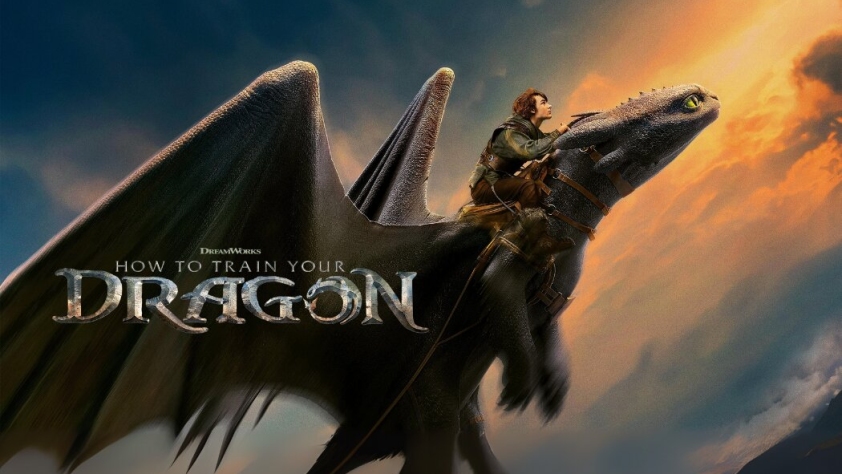 image of a boy riding on a black dragon who is flying through the clouds