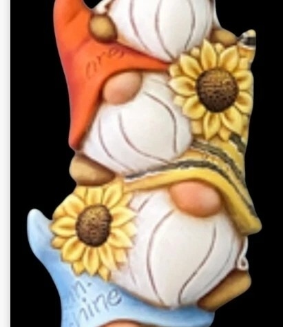 3 ceramic gnomes with sunflowers