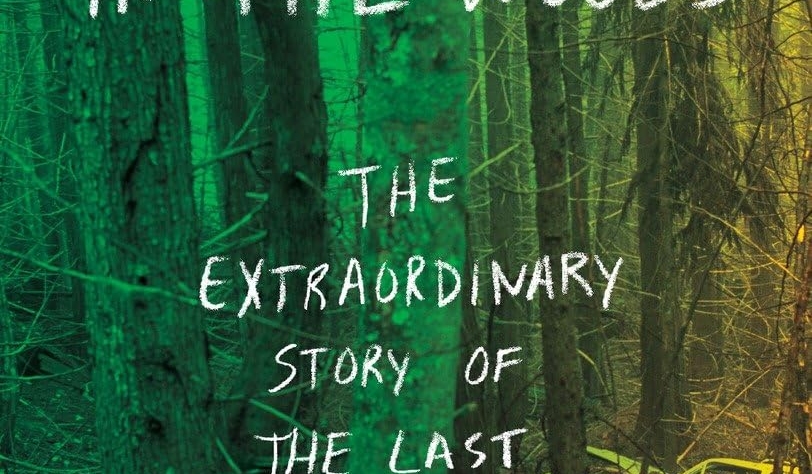 The Stranger in the Woods written by Michael Finkel book cover. A deserted old car in the woods