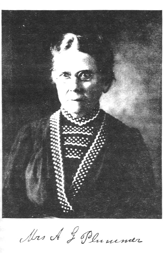 black and white photo of woman wearing glasses; Mrs. A. J. Plummer's signature beneath